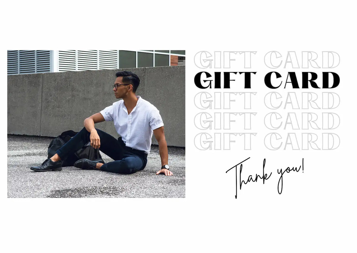 TheManEssens gift card banner, man in a white shirt sitting on a rooftop