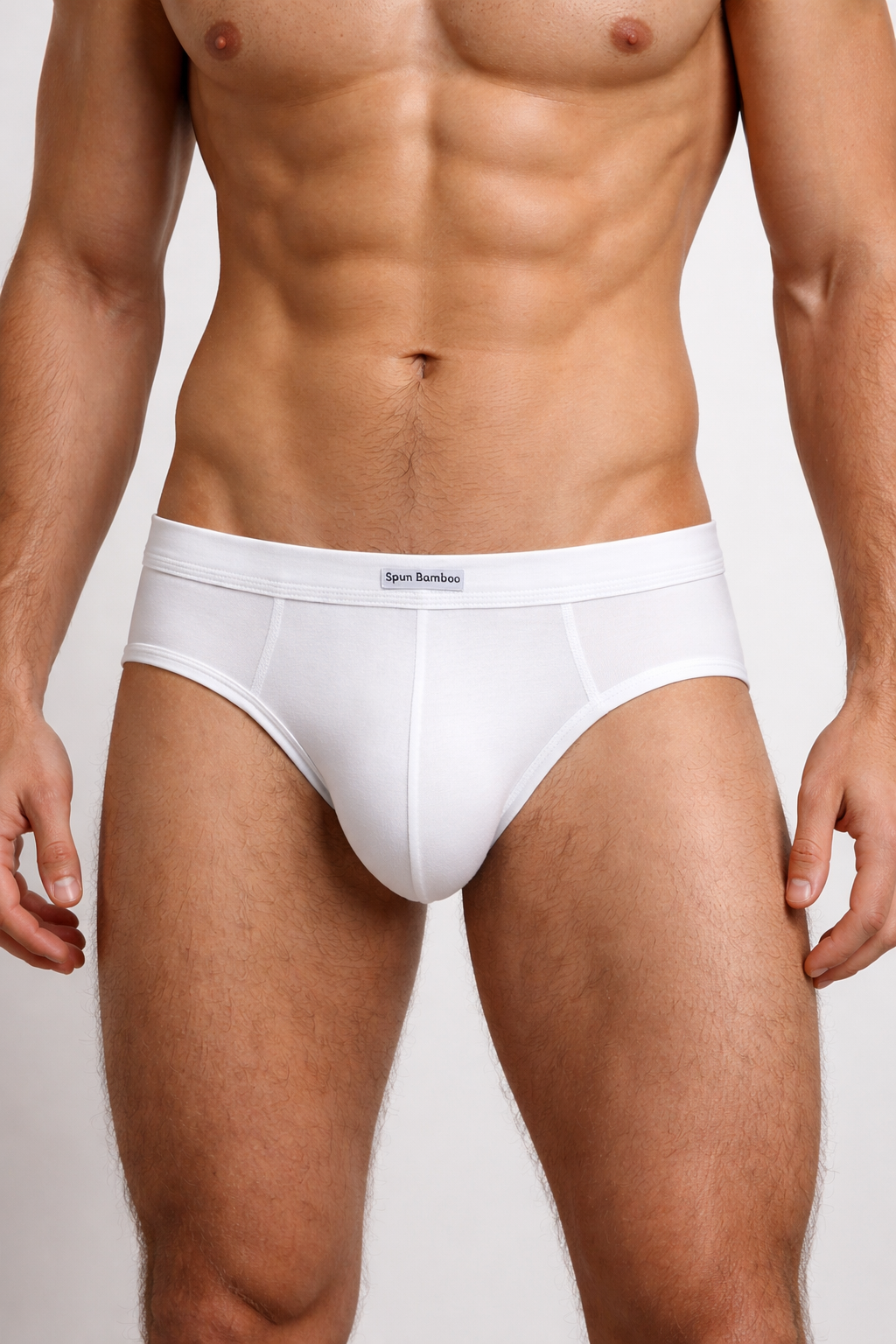 Model wearing white bamboo viscose briefs