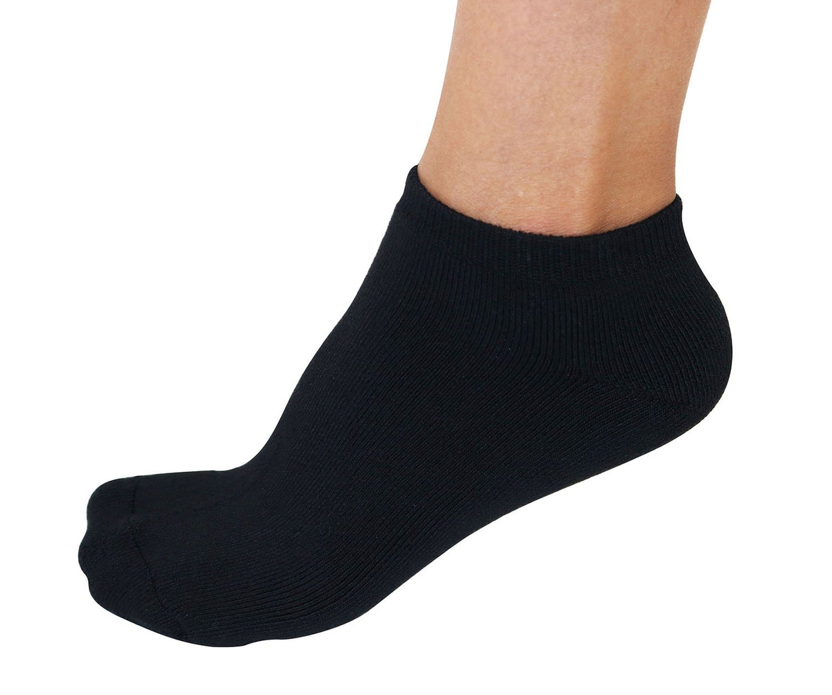 Black bamboo viscose no-show sport sock worn on the foot, side view