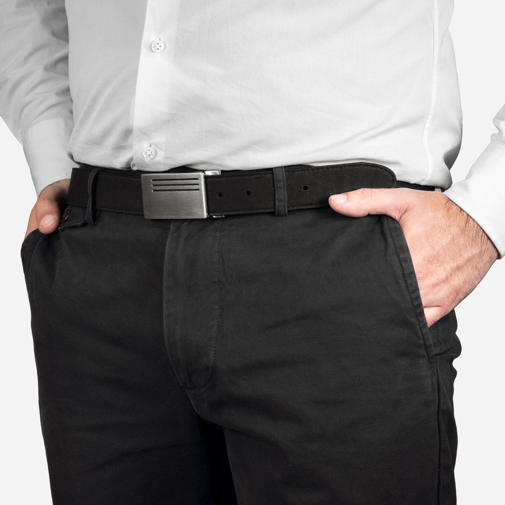 Man wearing the cork plaque buckle belt with dark trousers