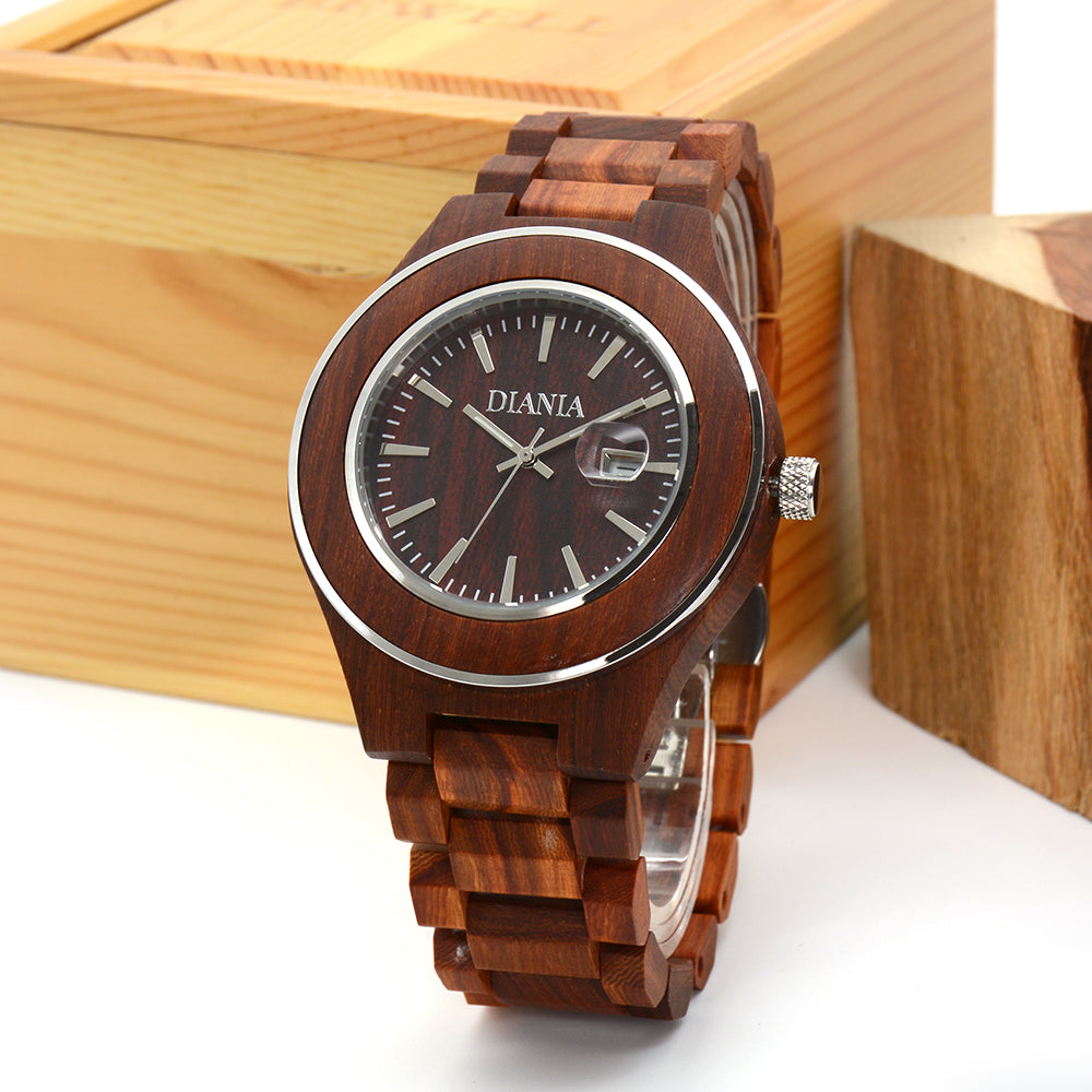 Torreta red sandalwood watch in front of wood blocks