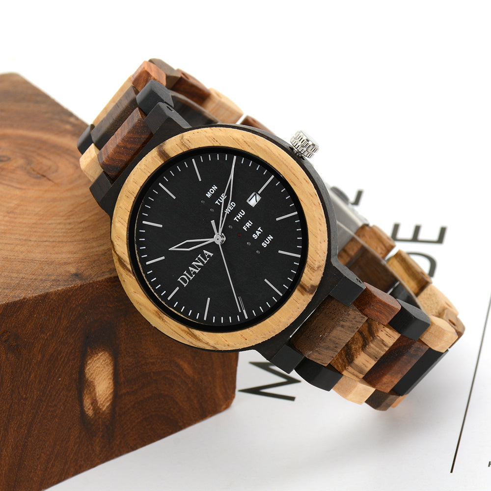 Rotglà black sandalwood and zebrawood watch reclined on wooden block