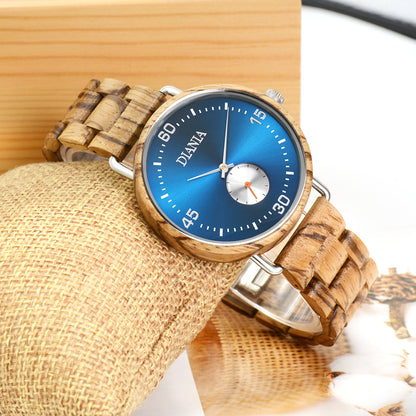 Ranes steel and zebrawood watch leaning on cushion
