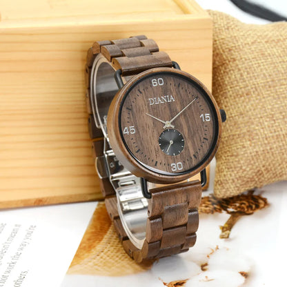 Llanera steel and black walnut watch in front of wood block