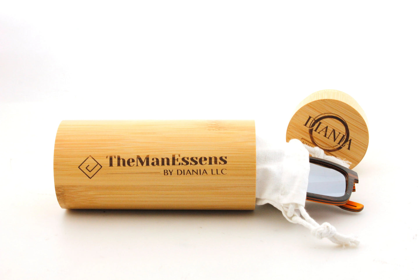 Aitana black laminated wood sunglasses inside cotton bag and bamboo cilinder case