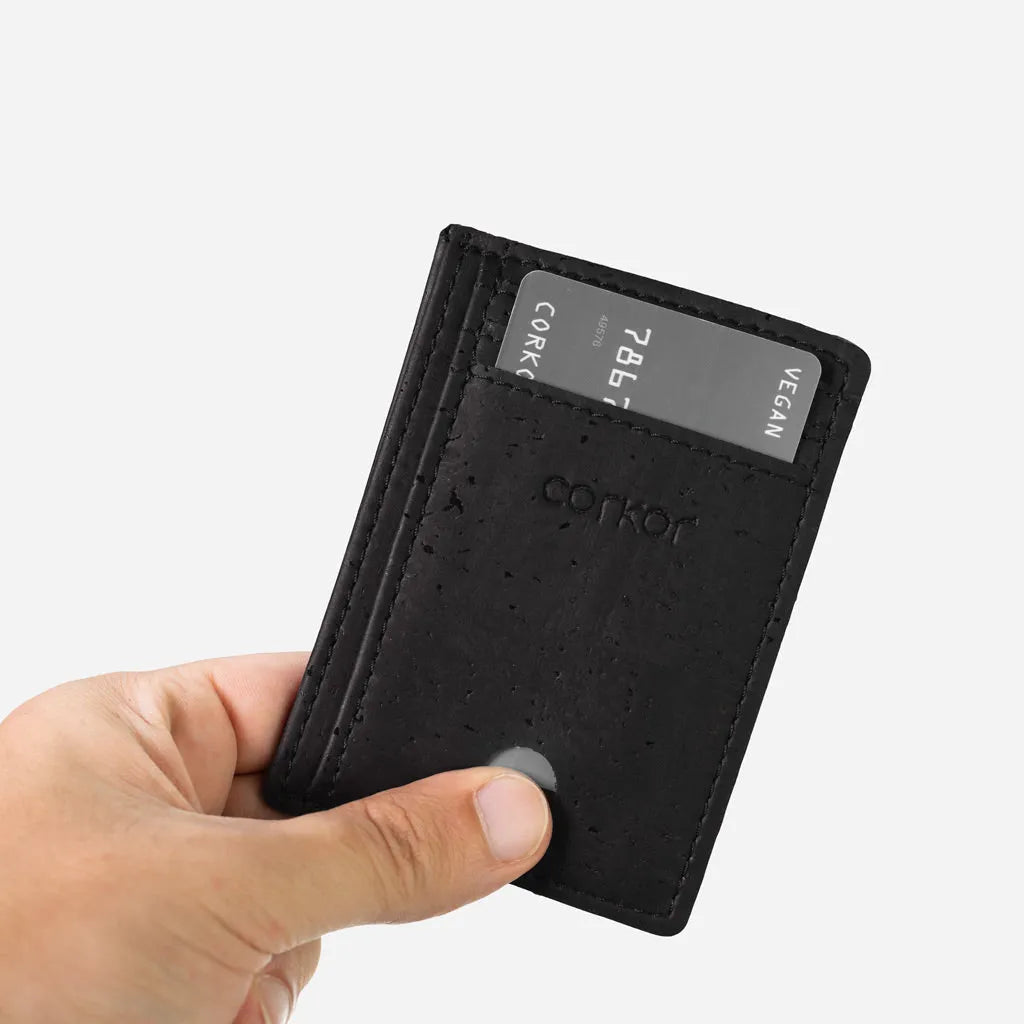Quick Access slot, hand taking out a card from the cards holder wallet.