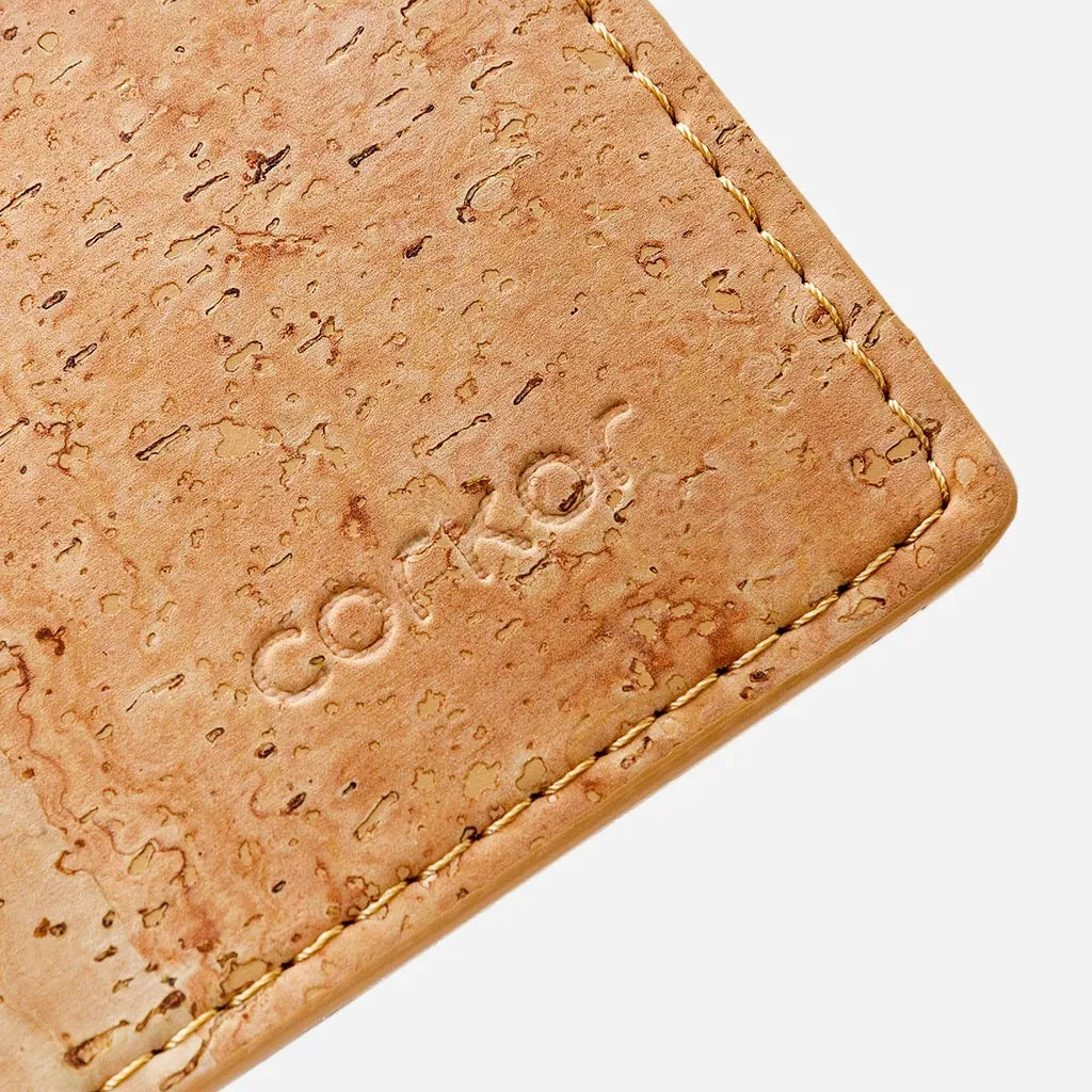 Closeup on the Corkor logo of the Cork Wallet with Coin Pocket.