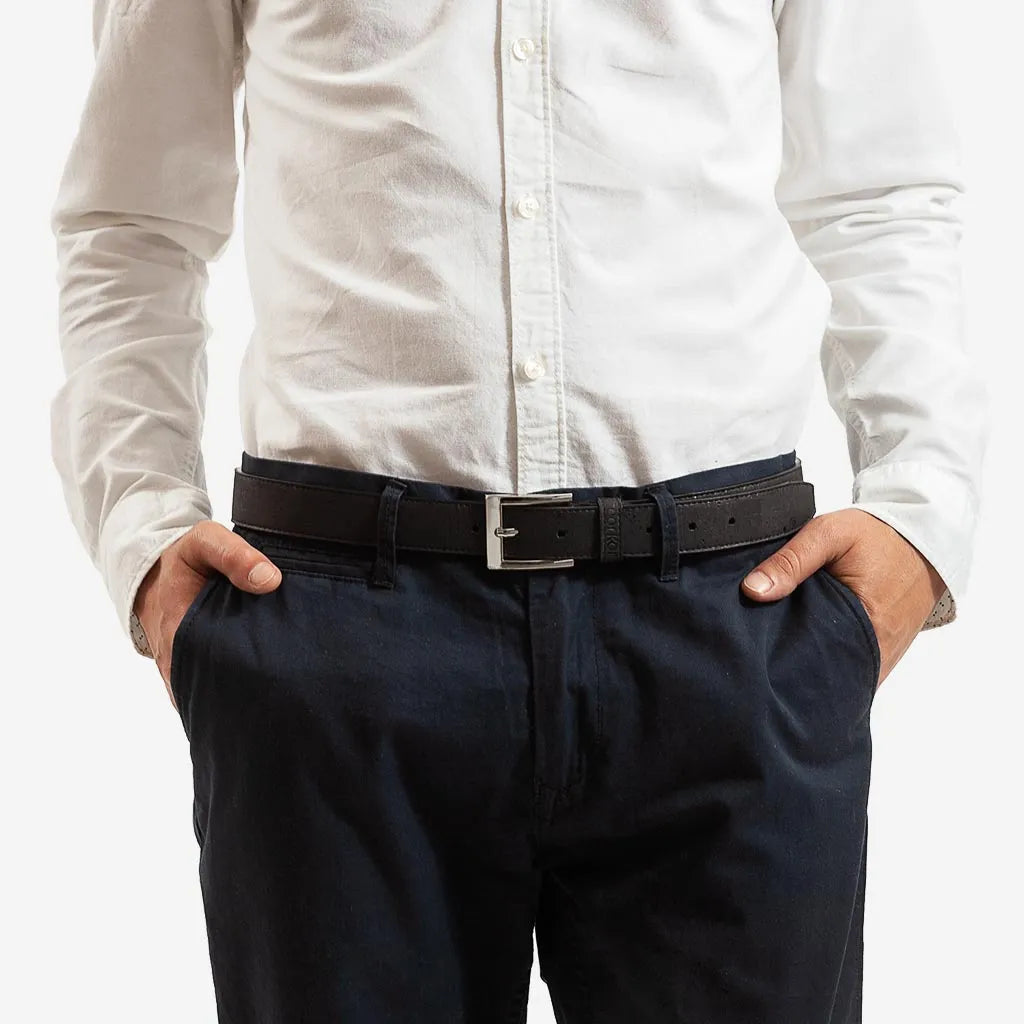Man wearing a black vegan belt made from genuine cork.