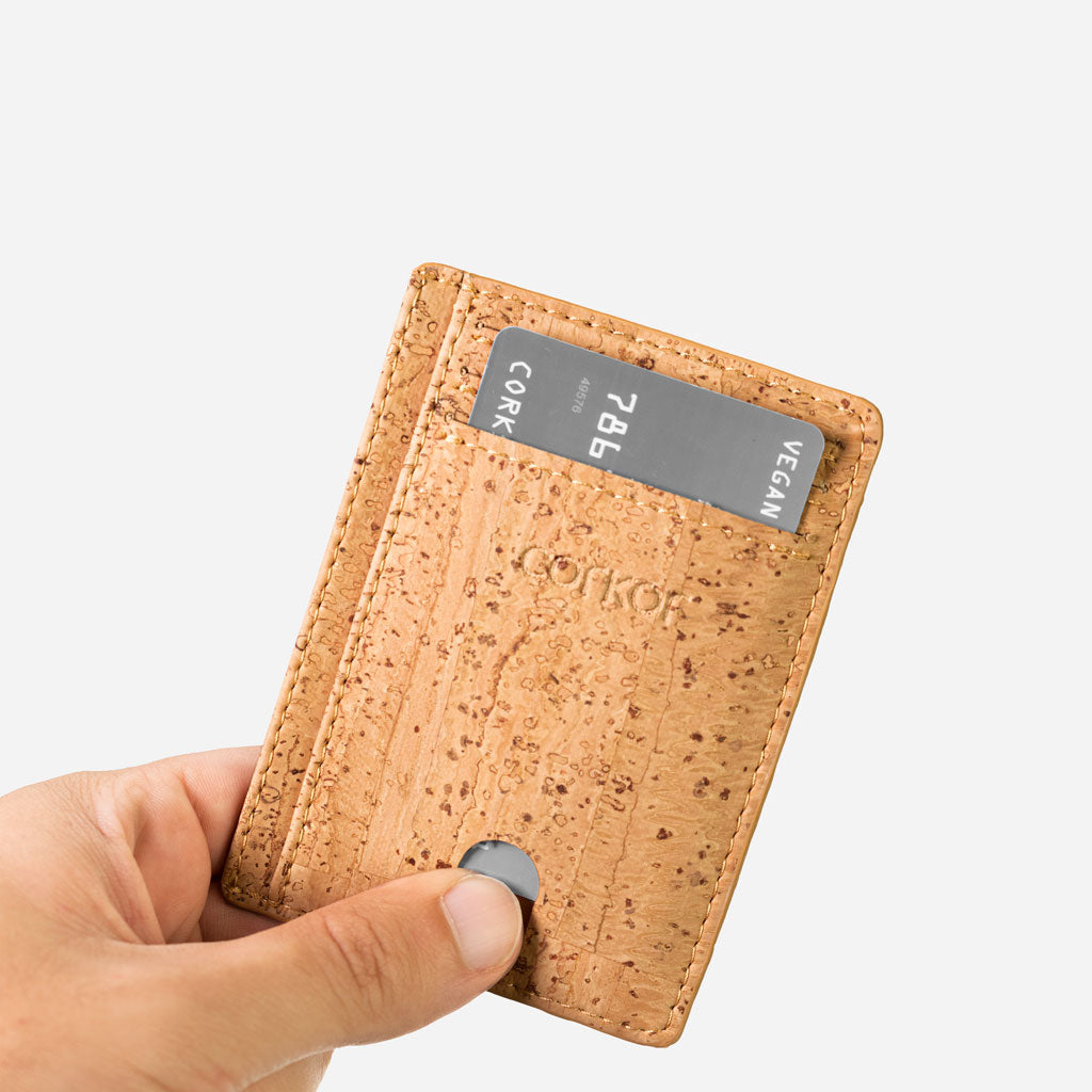 Quick Access slot, hand taking out a card from the cards holder wallet.
