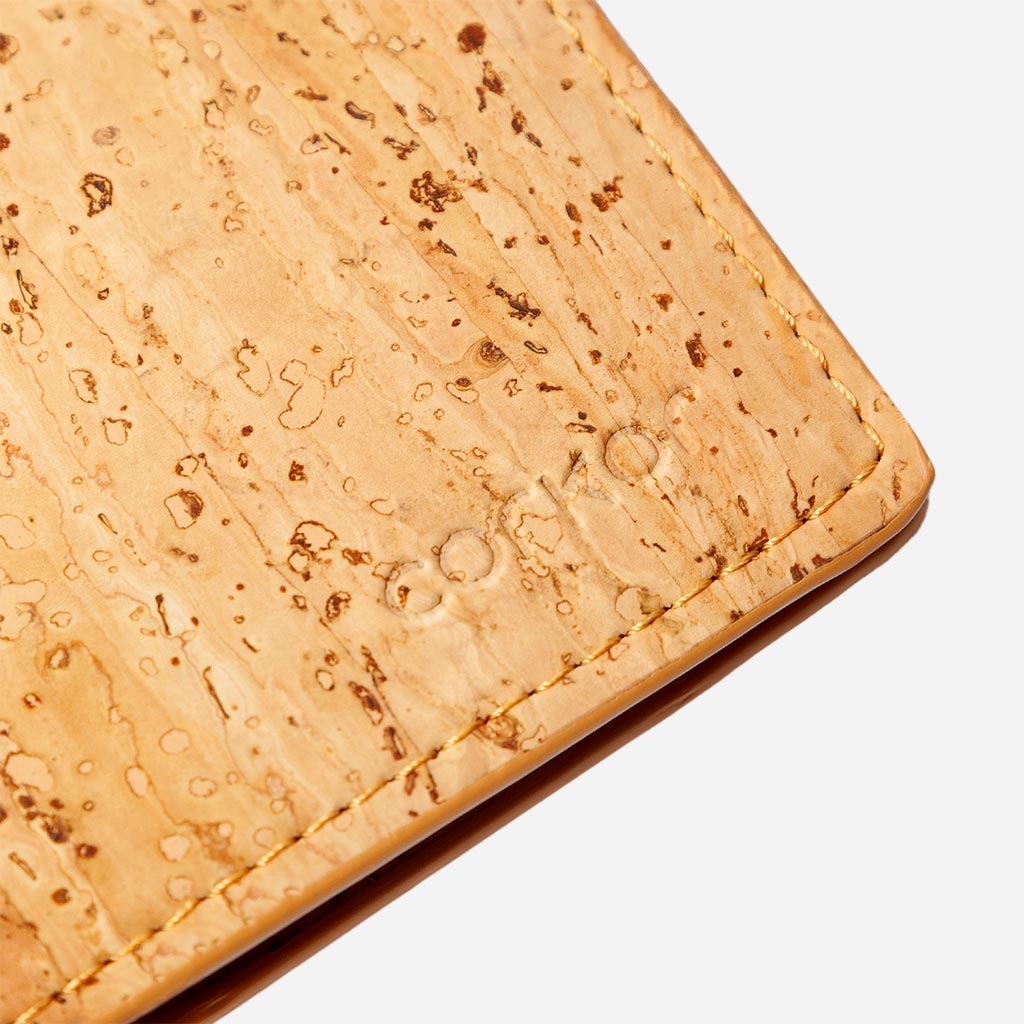 Closeup on the Corkor logo of the Bifold Wallet for men.