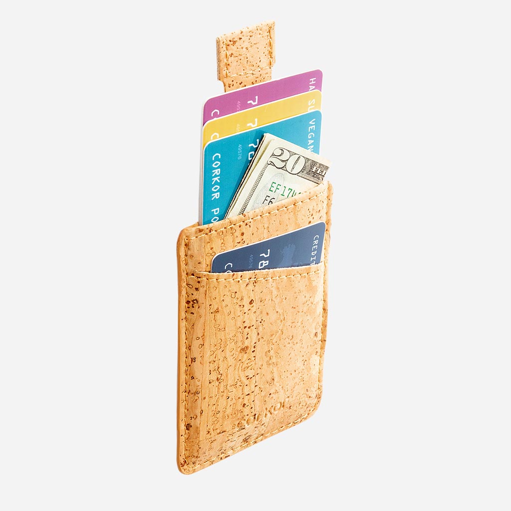 The Vegan Minimalist Cork Card Sleeve Wallet and its easy storage of cards and money.