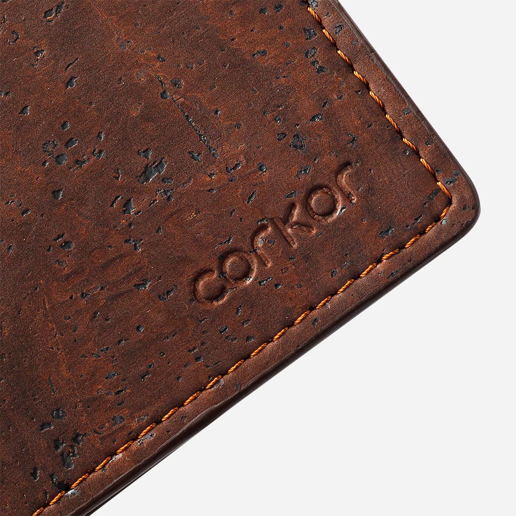 Closeup on the Corkor logo of the Cork Passcase Wallet
